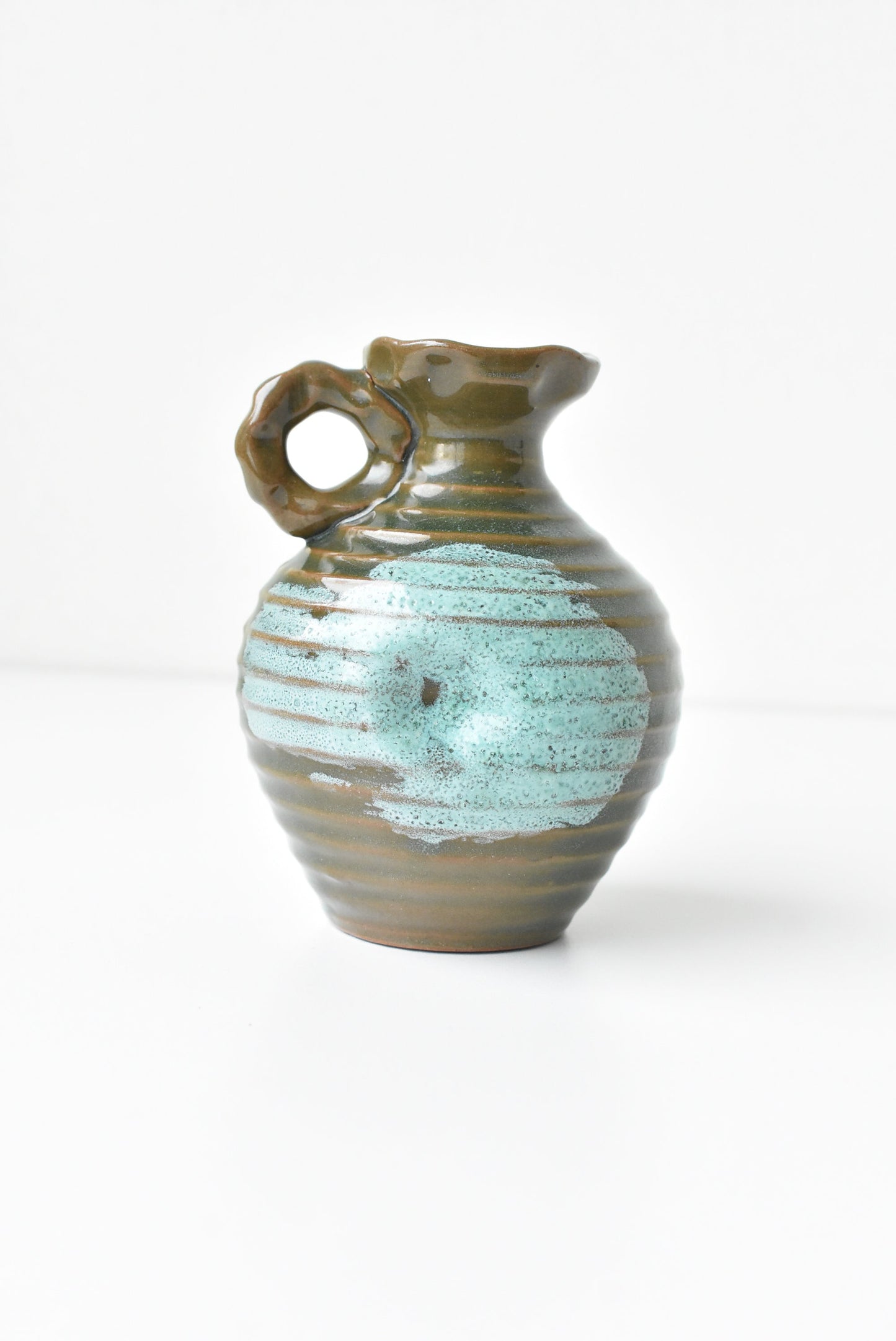 Glazed ceramic green vase
