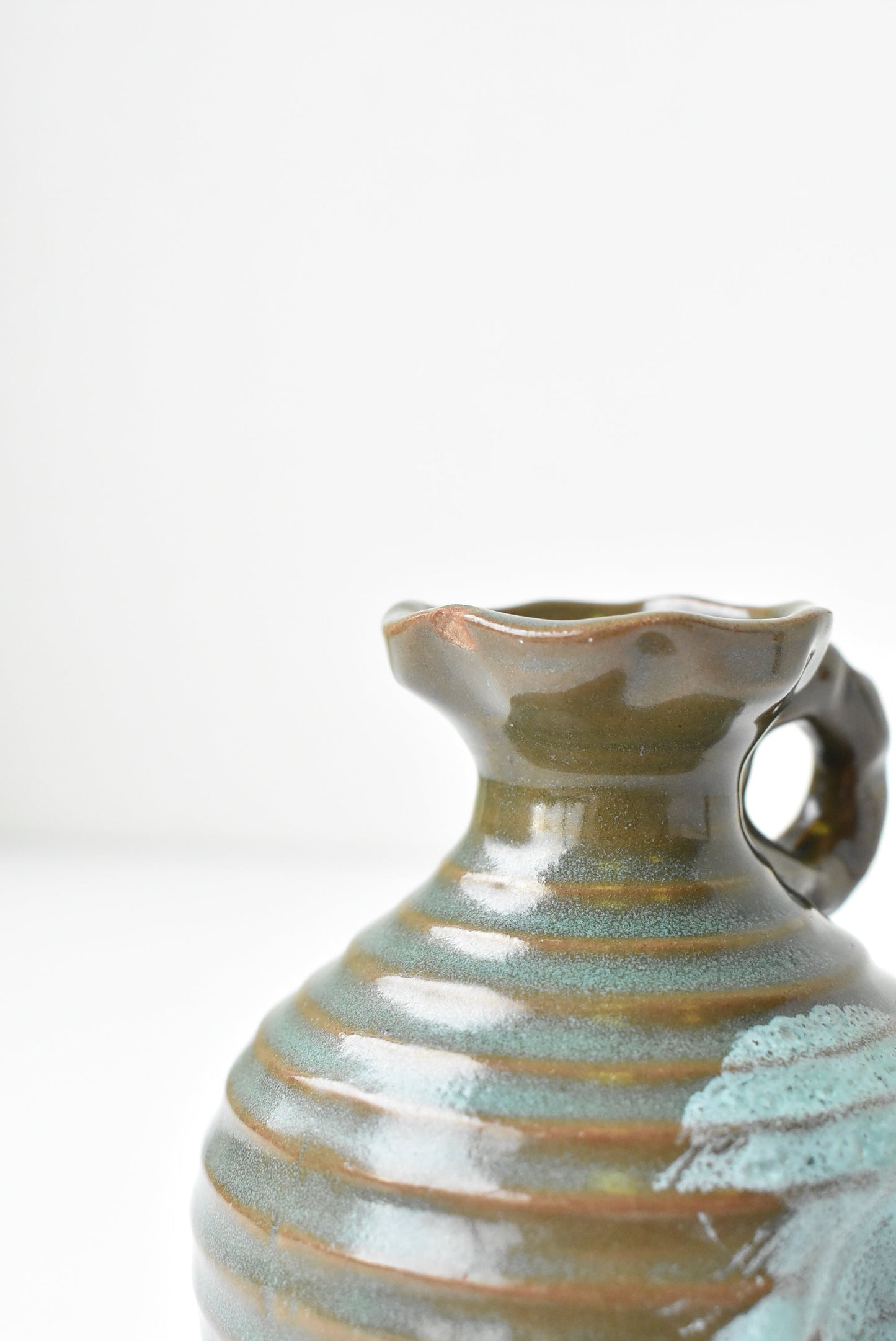 Glazed ceramic green vase