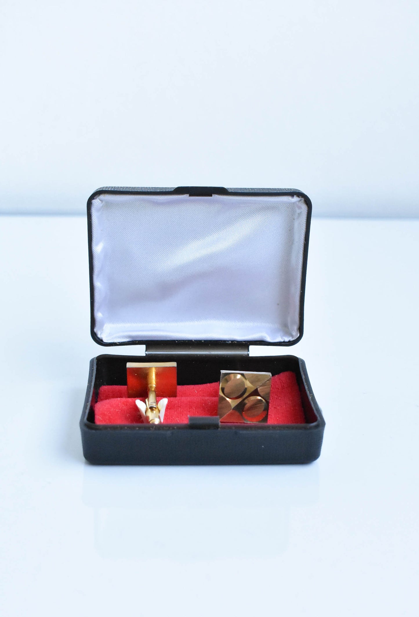 Retro cufflinks in box, golden with square emblem