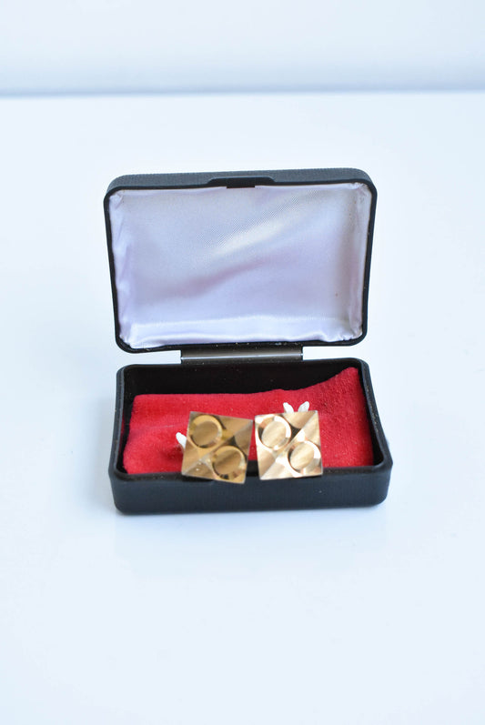 Retro cufflinks in box, golden with square emblem