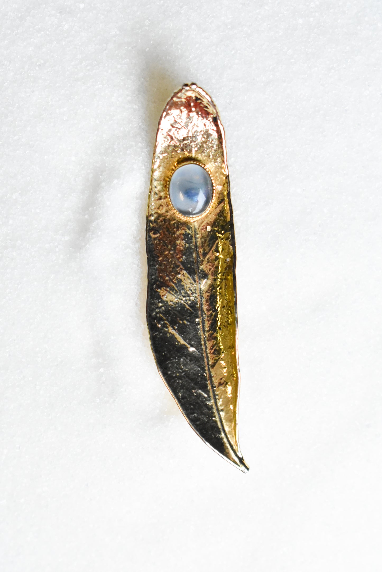 Leaf brooch with opaline stone