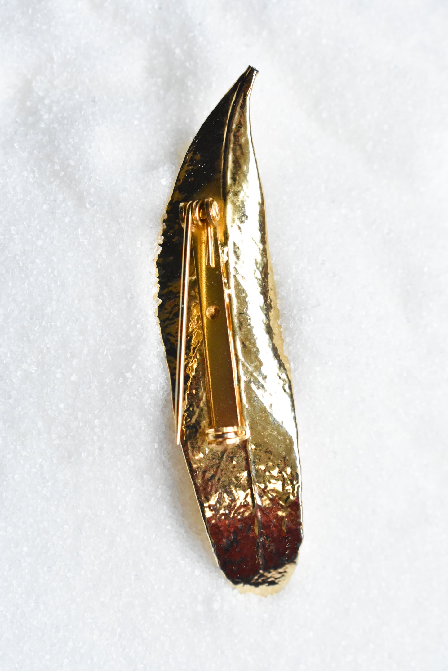Leaf brooch with opaline stone