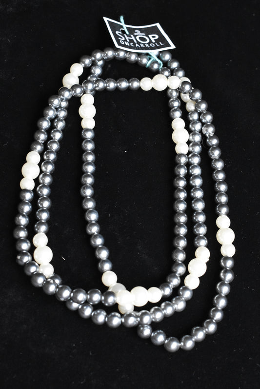 Plastic pearl beads.