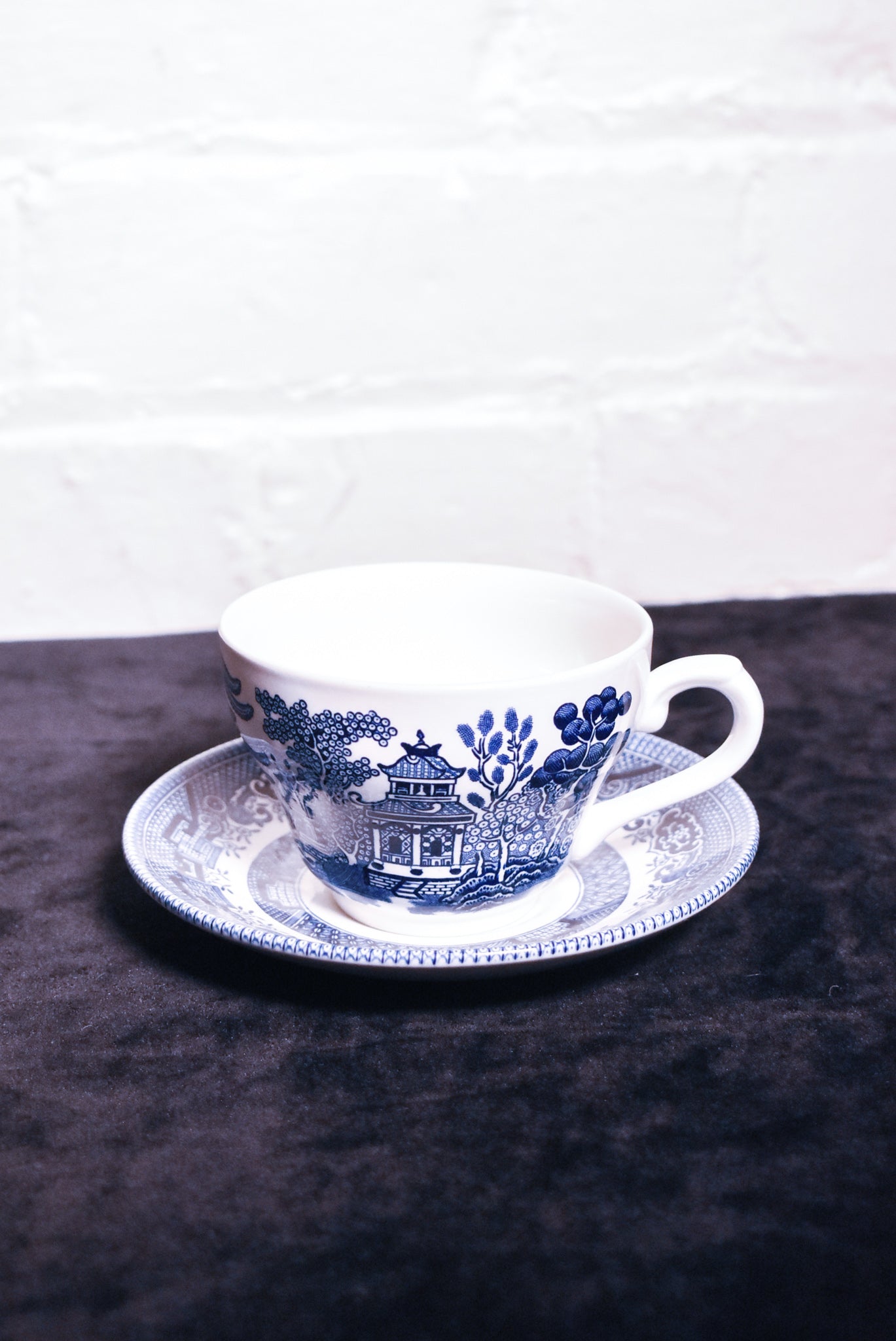 Blue and white cups and saucer. Willow pattern