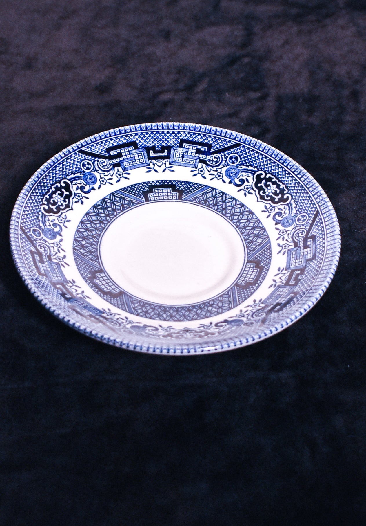 Blue and white cups and saucer. Willow pattern