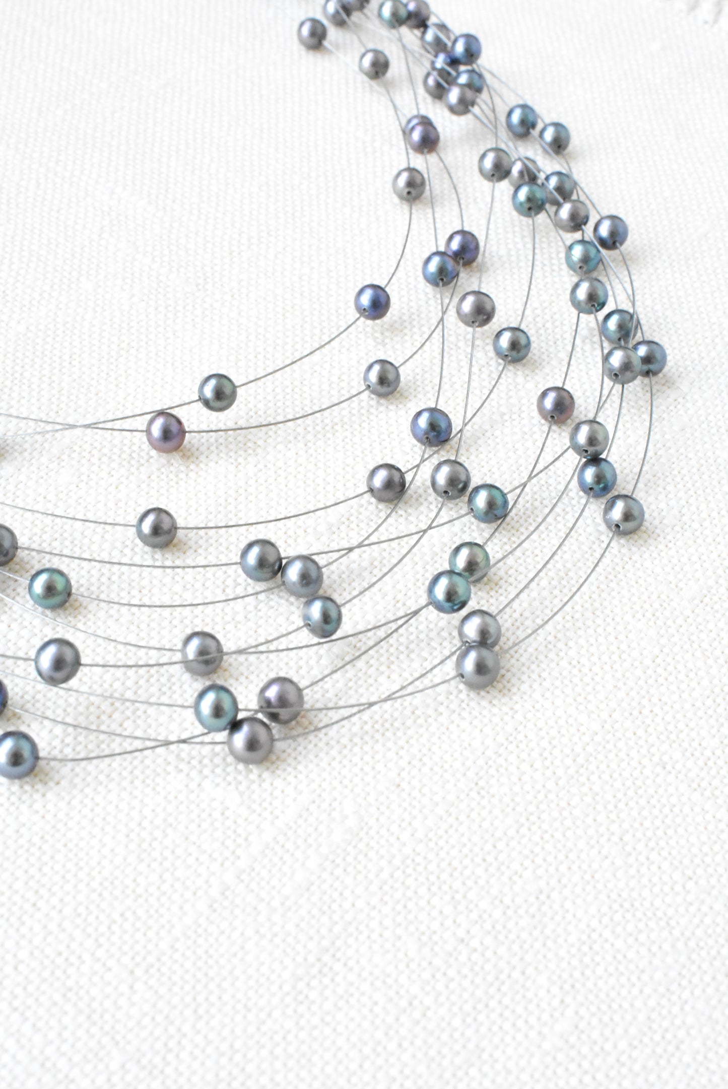 Cultured black pearl princess style multi strand necklace