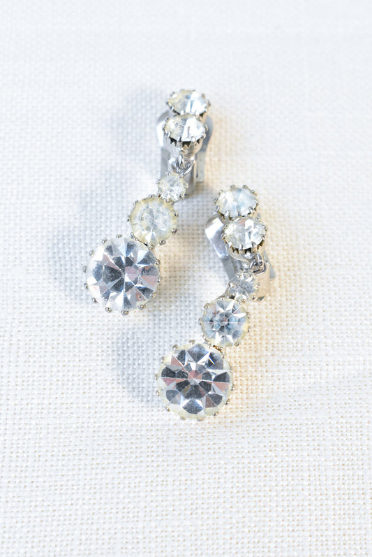 Five rhinestone clip-on earrings