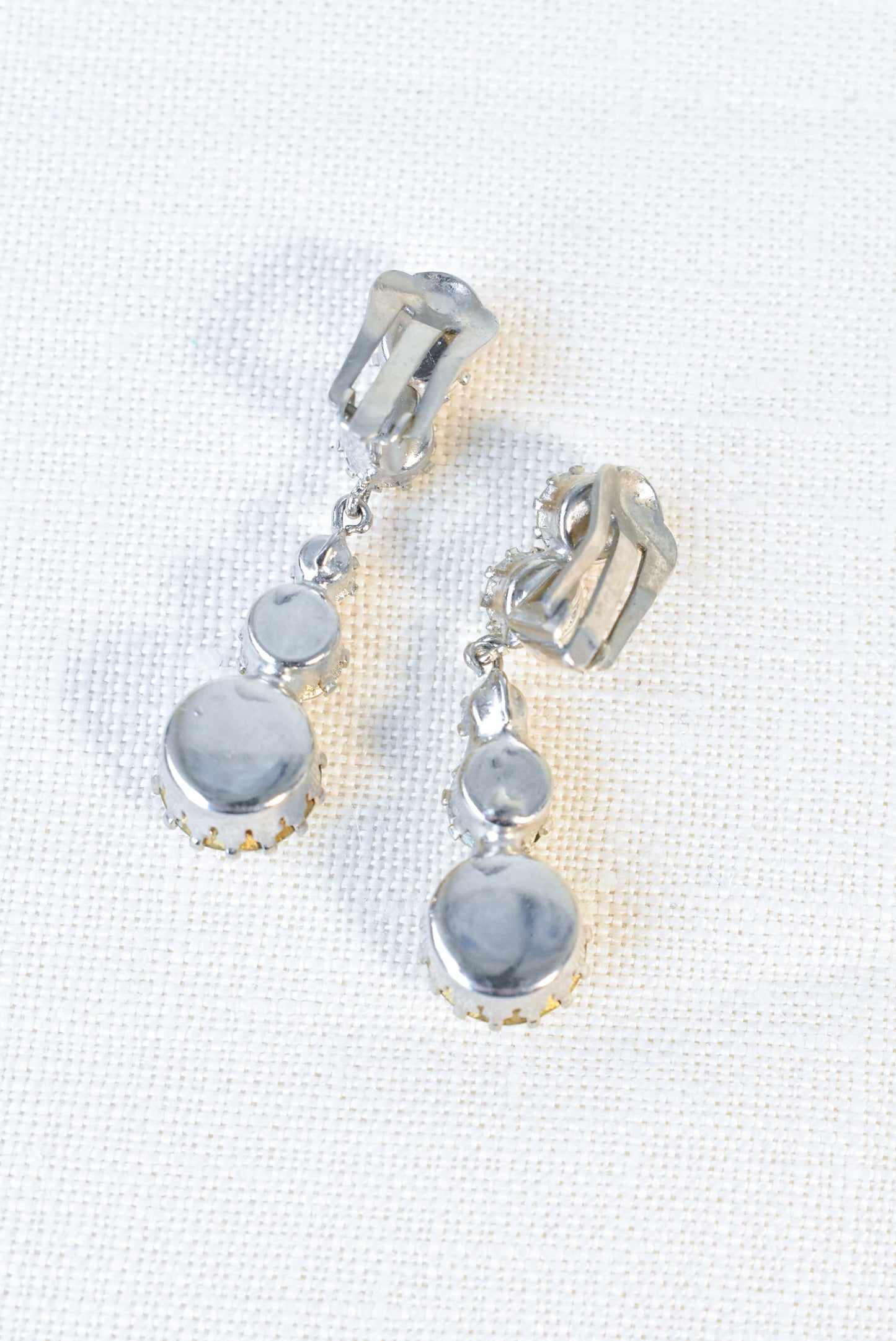 Five rhinestone clip-on earrings