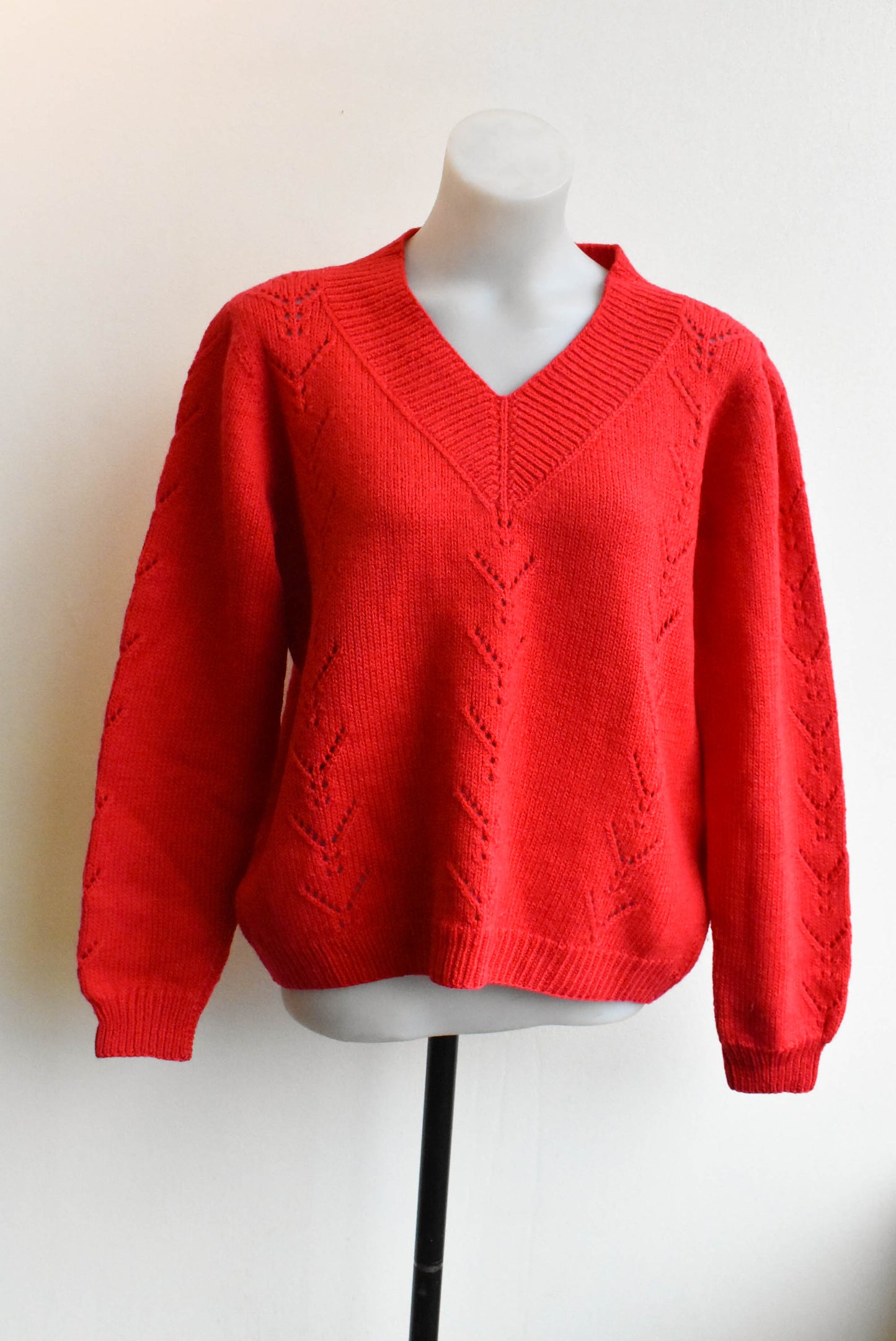 Red knitted v neck sweater