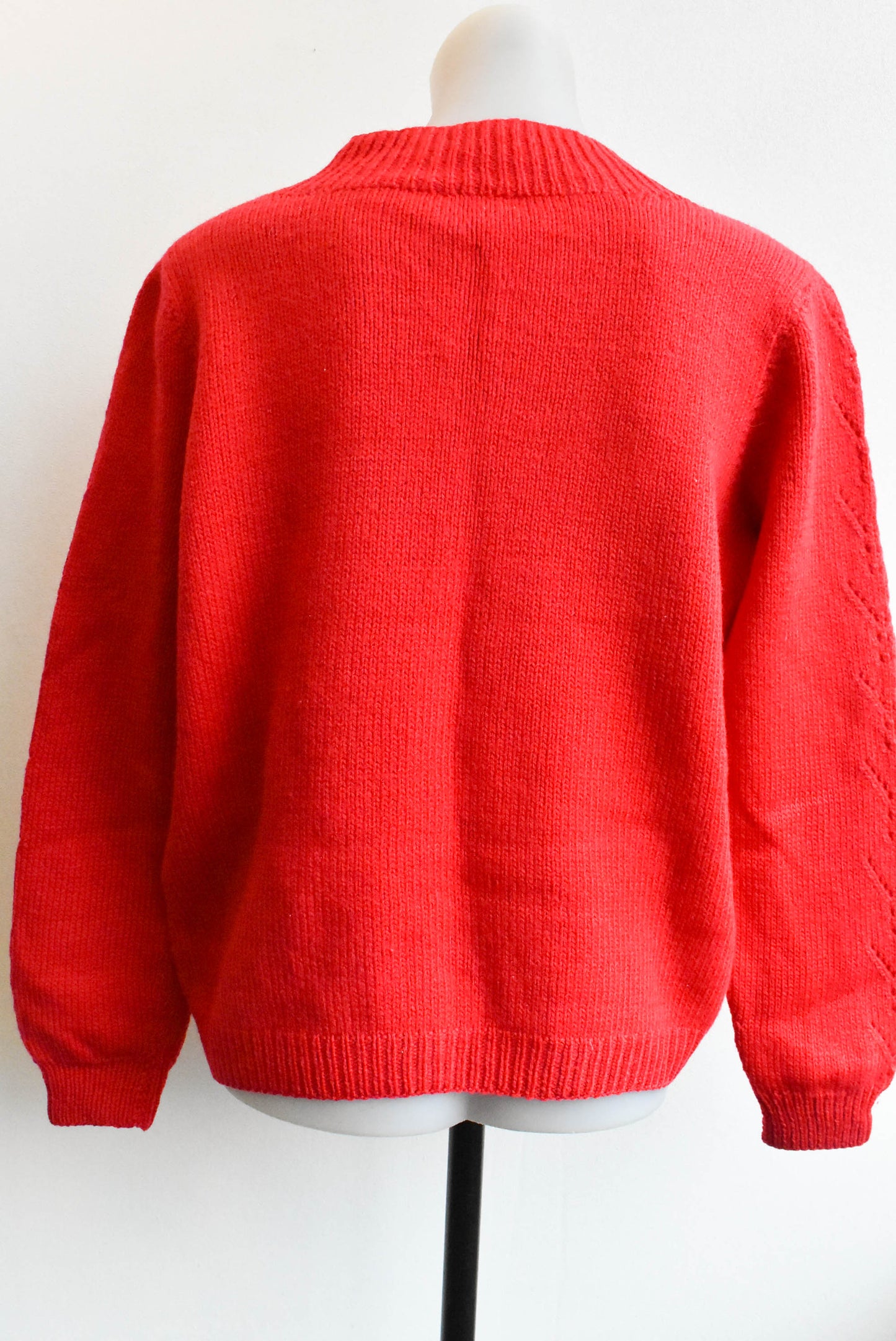 Red knitted v neck sweater
