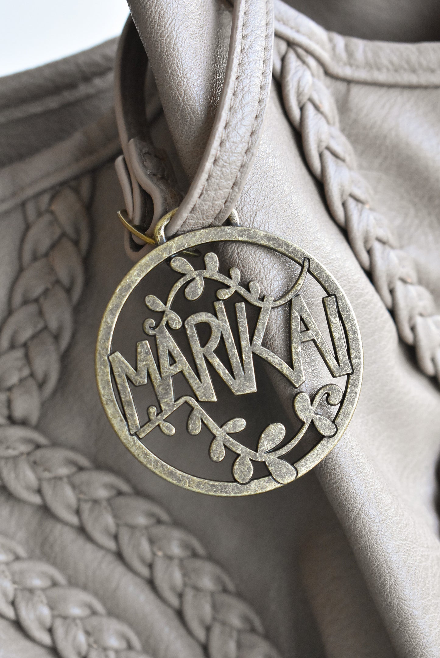 Marikai light faux-leather handbag with braids