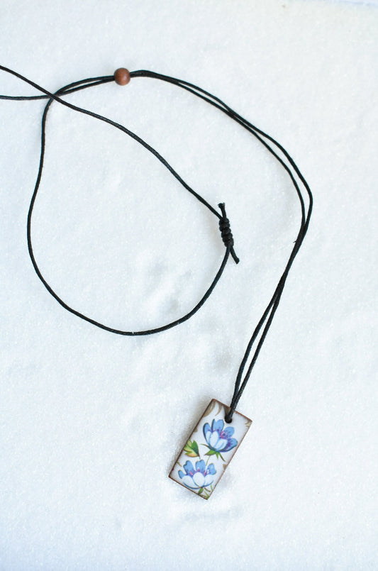 Blue flower pendant necklace