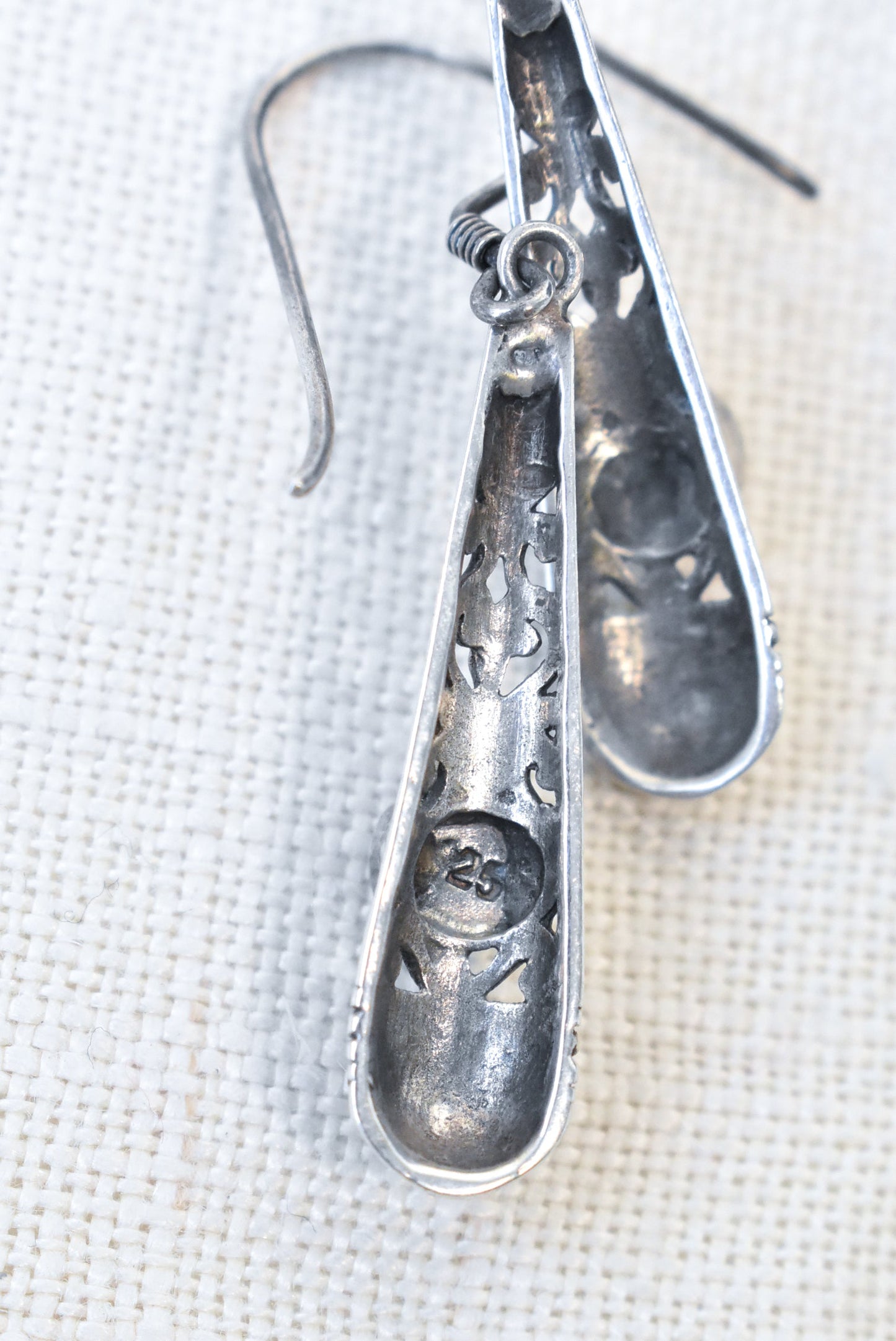 Silver & black stone hollow-backed earrings