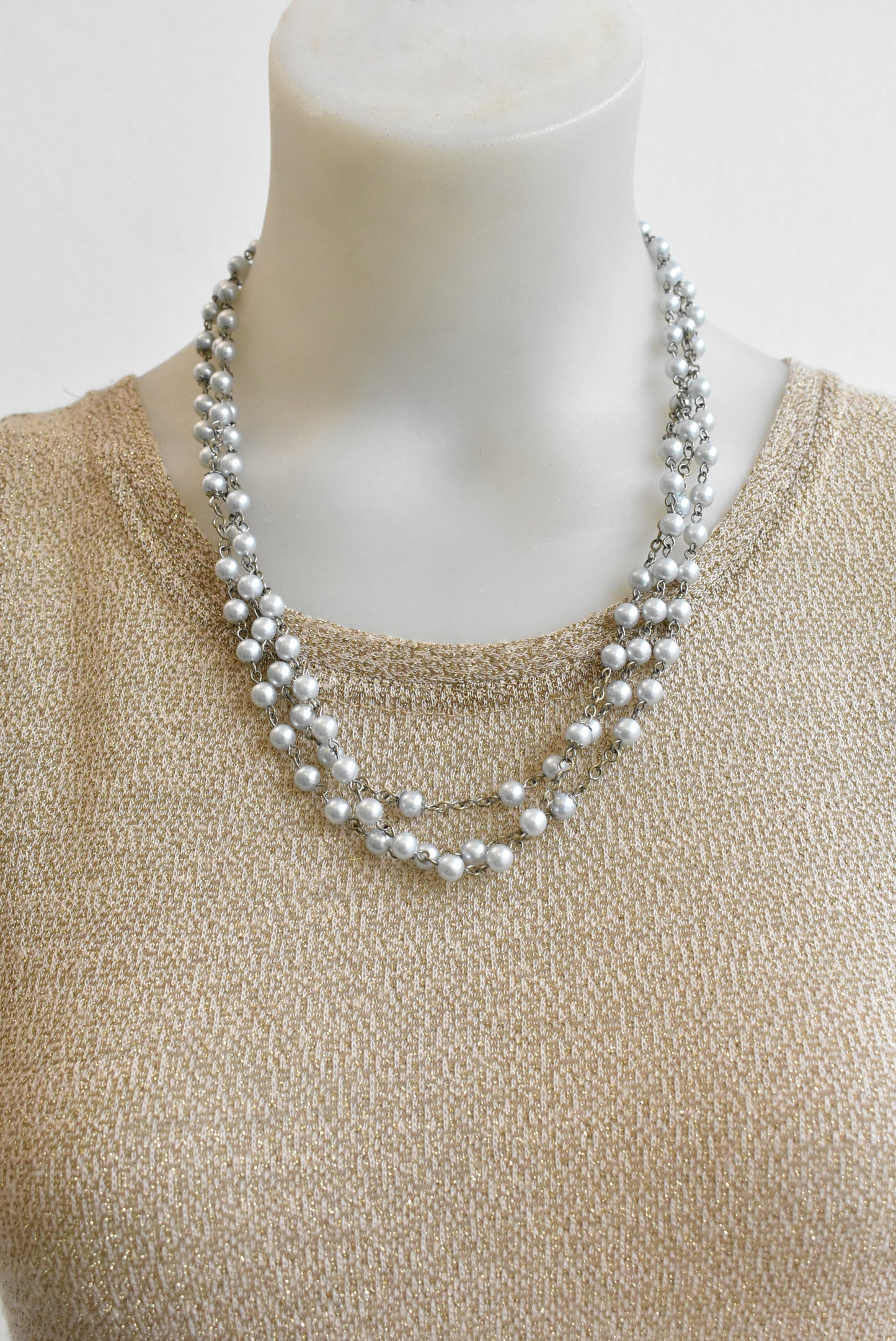Long pearlescent bead necklace