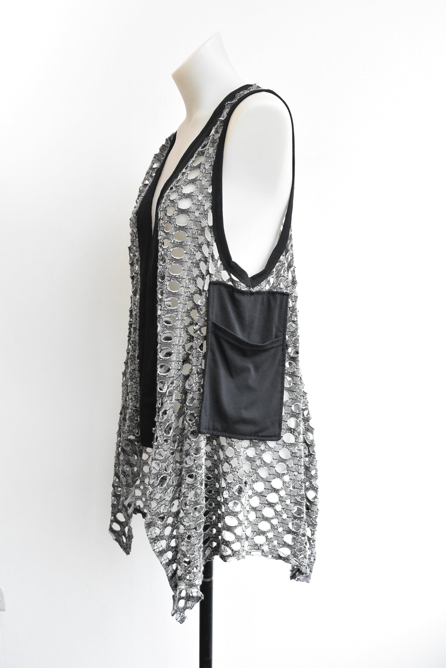 Olla Oh vest with holes & pocket detail, size S