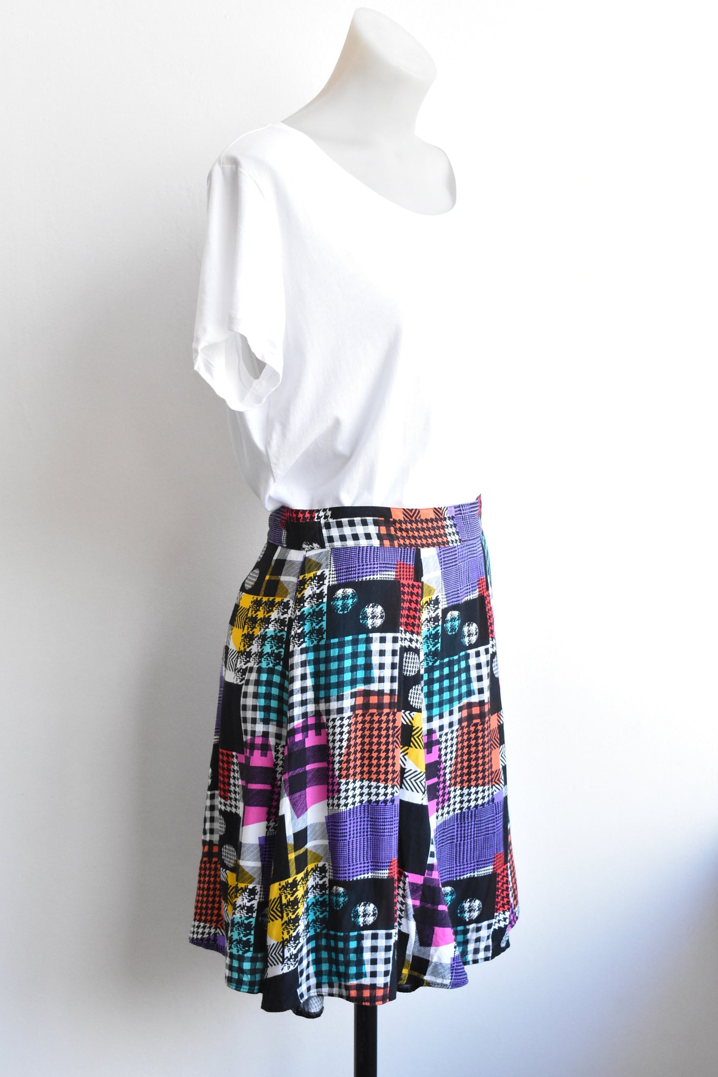 Warehouse 14 multi-patterned mini skirt, size S